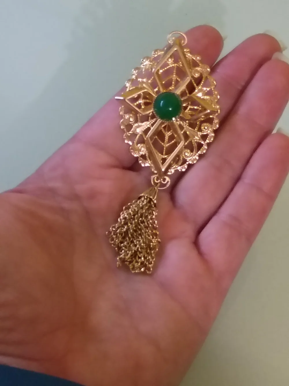 Sarah Cov Gold-Tone Filigree Brooch with Green Gem and Tassel